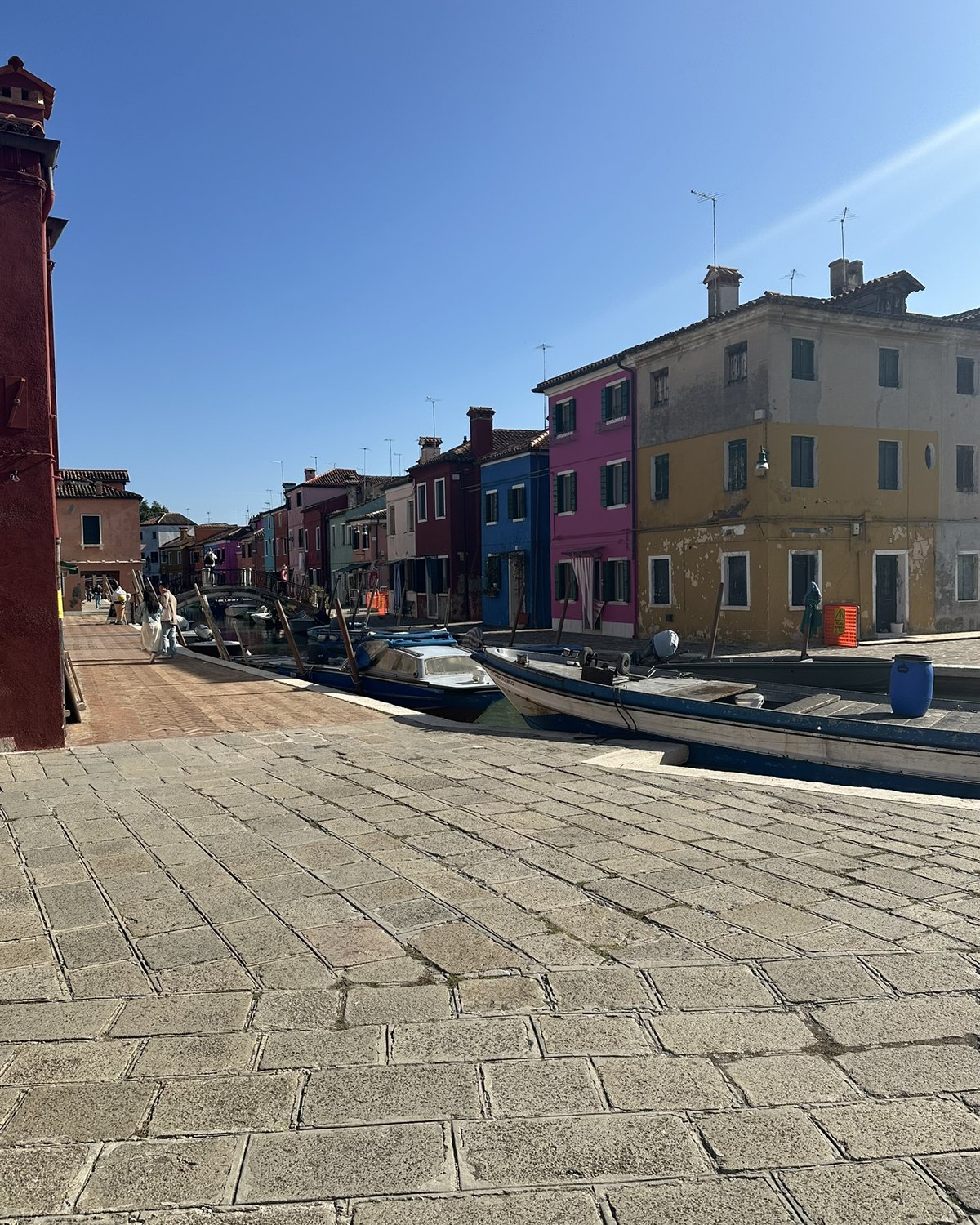 Colorful houses and canal on Burano island near Venice