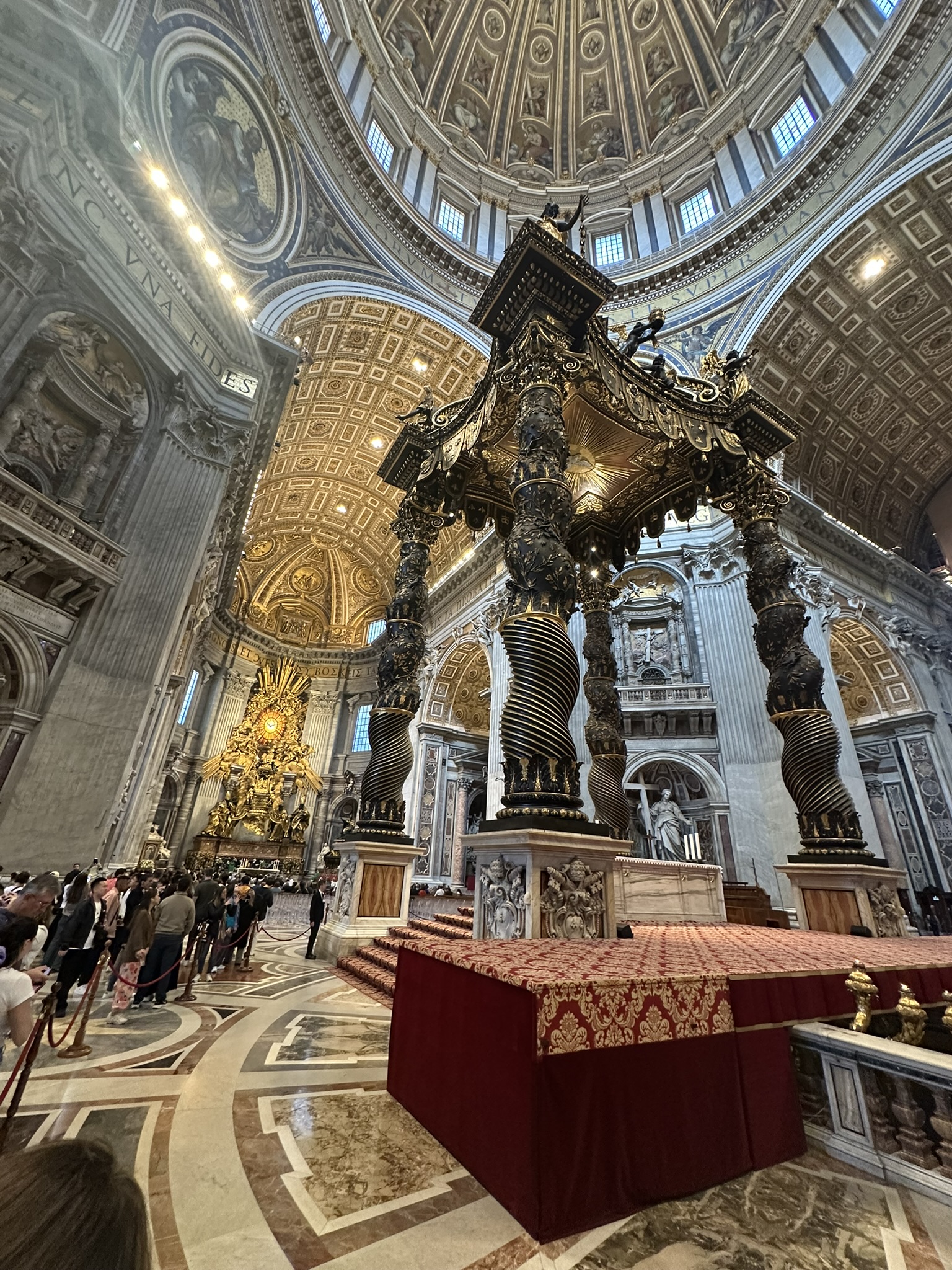 Bernini's enormous bronze Baldachin above the papal altar inside St. Peter's Basilica